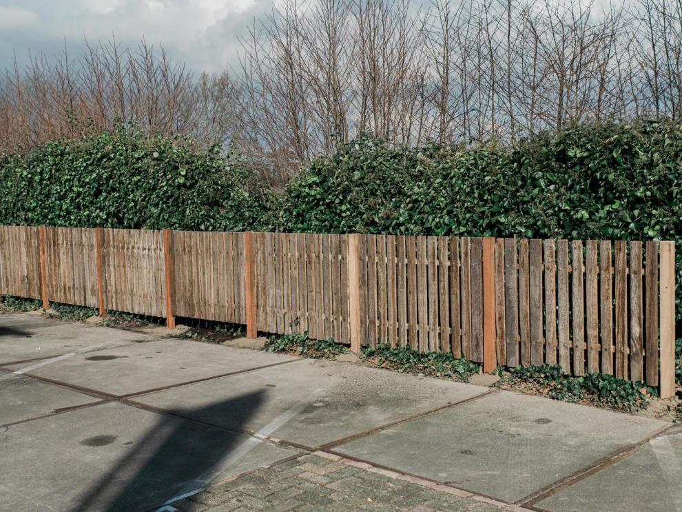  Wooden fencing developed with old stable grids